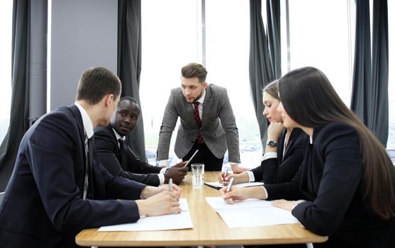 Manager yelling at his employees at the meeting. Company is in recession.