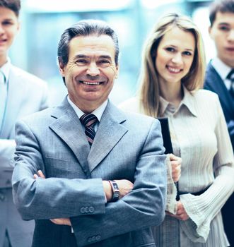 Group portrait of a professional business team looking confidently at camera