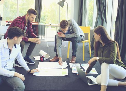 Group of young business people. They working on new project. Startup concept.