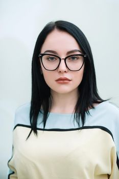 close up. portrait of modern business woman with glasses . isolated on white.