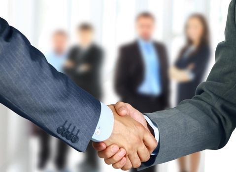 Business people shaking hands, finishing up a meeting