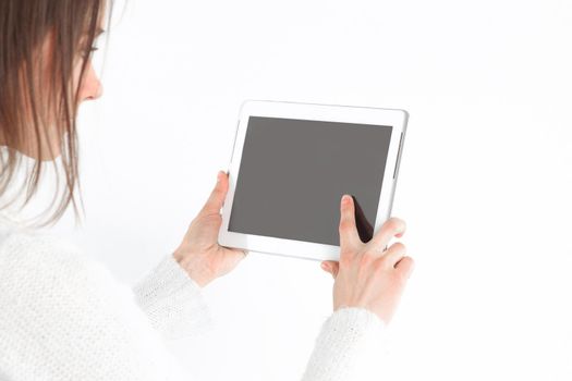 close up. young woman tapping the screen of digital tablet.photo with copy space.