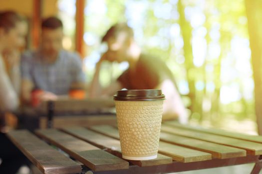 cup of coffee on table in cafe.