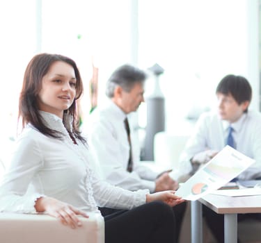 portrait of business woman on the background of colleagues.photo with copy space