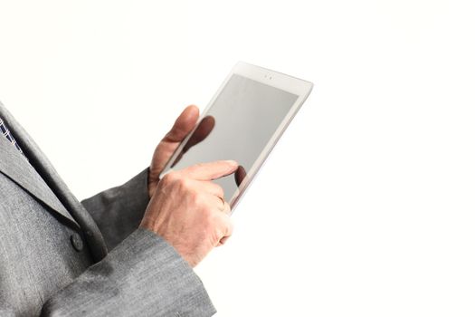 close up.businessman pointing finger at the digital tablet screen.isolated on white background.