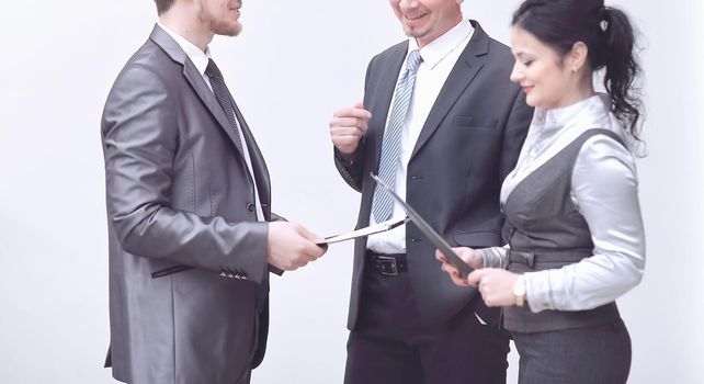 business people discussion over documents in empty office.office weekdays