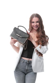 stylish young woman with fashionable handbag.isolated on white.