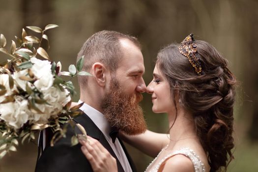 close up.couple in love on the background of the forest.