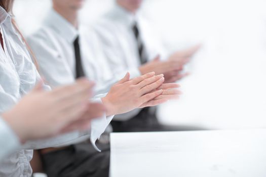 close up.business team applauding at the meeting. success concept