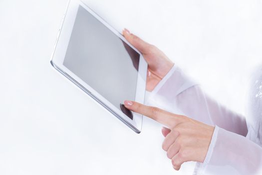 close up. business woman uses digital tablet . photo with copy space