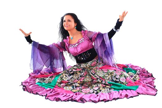beautiful brunette dances a Gypsy dance.isolated on white background