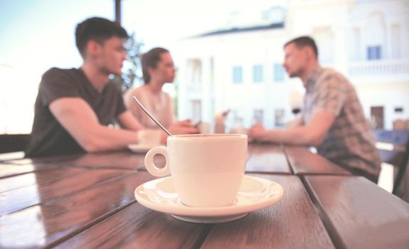 cup of coffee on table in cafe.
