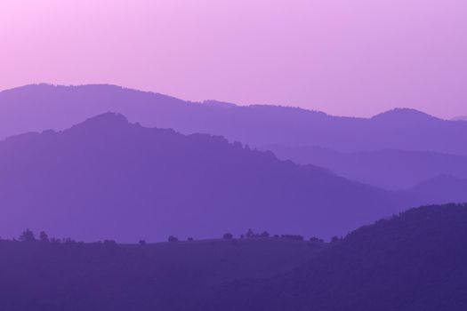 ultra violet purple summer landscape  nature in sunset in mountains and hills on countryside abstract lines and curves background