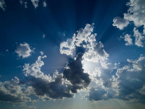 summer evening  blue sky with beautiful clouds and sunshine