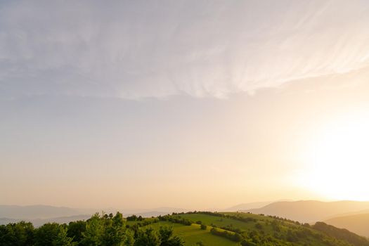 landscape of  summer nature in sunset in mountains and hills on countryside abstract lines and curves background