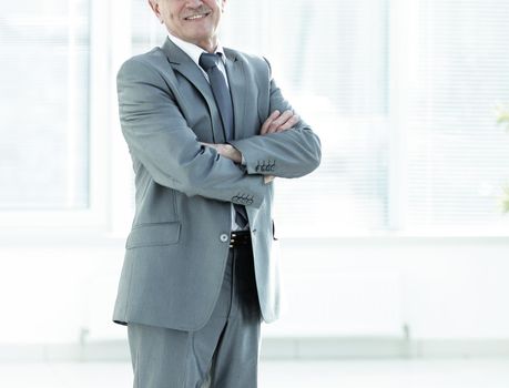 portrait of a successful Mature businessman in modern office photo with copy space