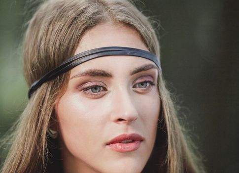 close up. portrait of beautiful young hippie woman