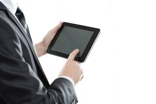 close up.businessman tapping the screen of the digital tablet.photo with copy space