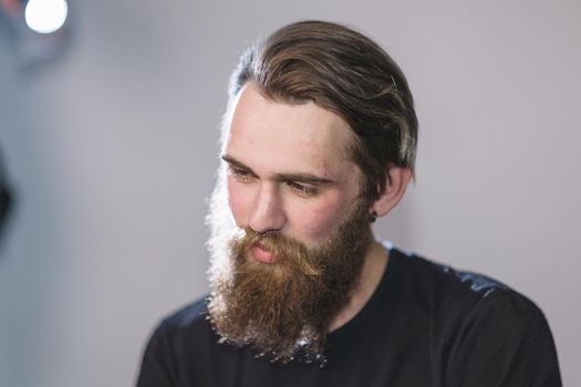 close up. portrait of a handsome bearded man . isolated on dark background