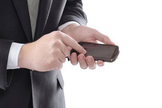 close up. businessman typing SMS on smartphone.people and technology