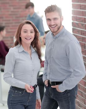 Smiling business people attending work meeting