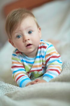 cute  little newborn baby smilling  at home