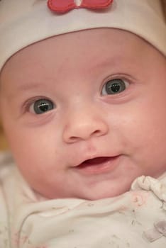 portrait happy cute newborn little baby smilling  at home