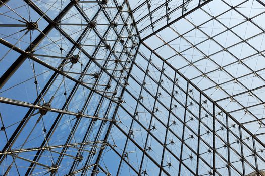 Metal roof top structure with glass construction background from Museum  du Louvre in paris france