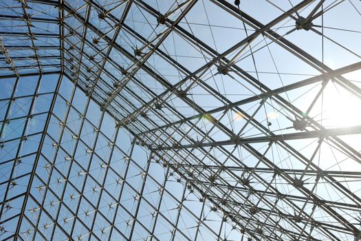 Metal roof top structure with glass construction background from Museum  du Louvre in paris france