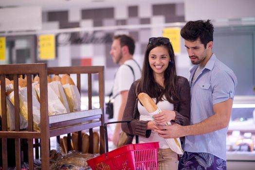 Young couple shopping in a supermarket