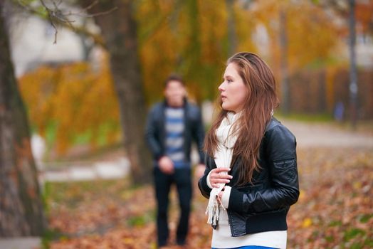 romantic young couple have fun in city park at autumn season