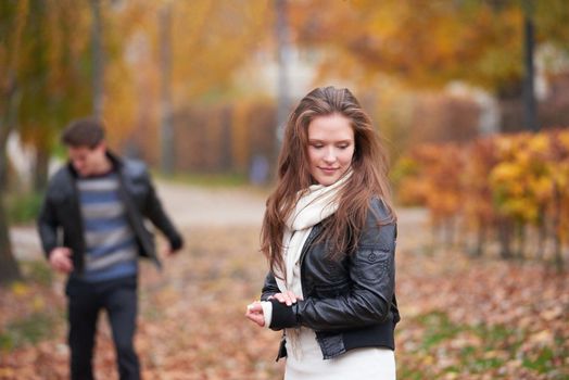 romantic young couple have fun in city park at autumn season