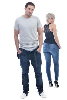 young couple isolated on white in fashionable underwear and blue jeans clothing