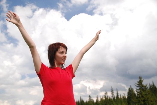 girl with arms wide open and sky background (Multiple values)