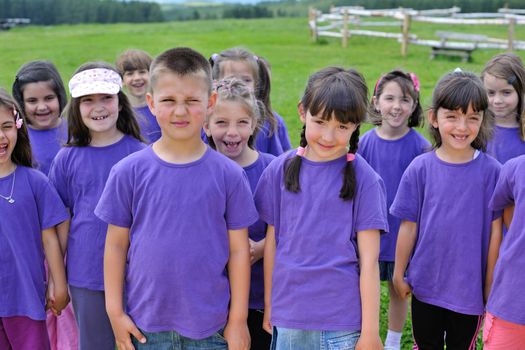 happy kids group have fun in nature outdoors park