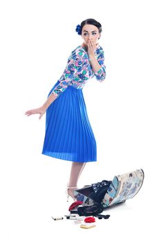 pretty young happy woman with travel bag waiting and posing isolated on white backround  in studio