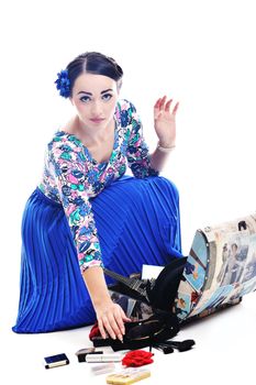 pretty young happy woman with travel bag waiting and posing isolated on white backround  in studio