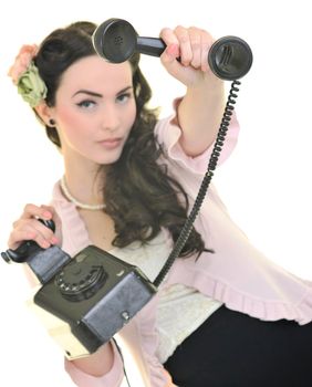 beautiful young woman girl talking on old phone isolated on white in studio