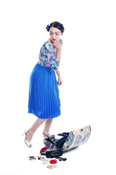 pretty young happy woman with travel bag waiting and posing isolated on white backround  in studio