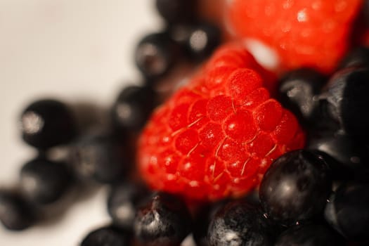 picture of fresh red strawberries with a lot of blackberries