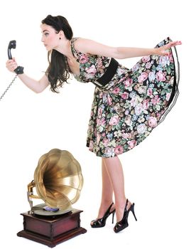 pretty young woman talking by old phone and mouse cursor arrow is holding her skirt