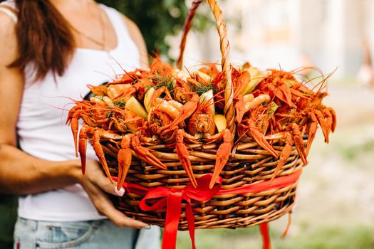 Festive woven gift basket for a man with crayfish and lemons