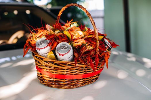 Top view of original edible bouquet with crayfish, dill, lemon, beer for unusual male gift