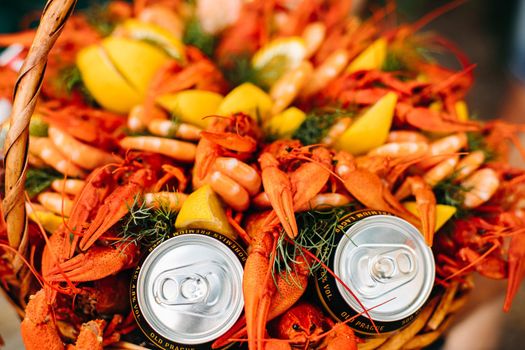 Top view of original edible bouquet with crayfish, dill, lemon, beer for unusual male gift