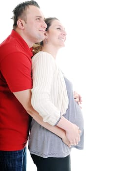 young family couple together in studio isolated on white. happy and waiting for baby