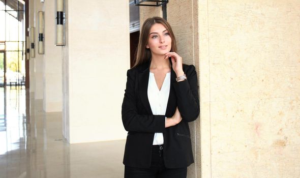 Modern business woman in the office with copy space