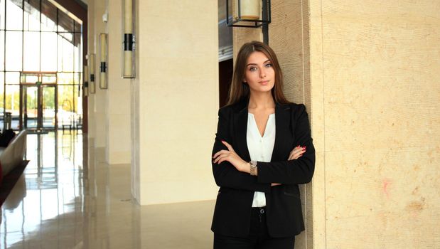 Modern business woman in the office with copy space