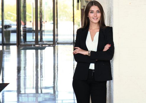 Modern business woman in the office with copy space