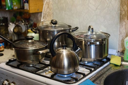 Picture with a lot of cookware. Cooking in the kitchen