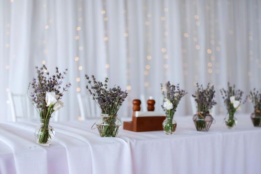 The presidium of the newlyweds in the banquet hall of the restaurant